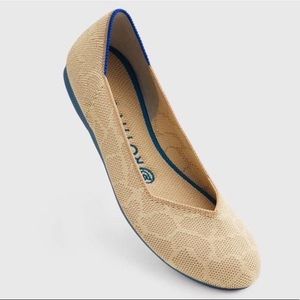 Rothy’s Flat in Sahara Gold Giraffe, size 7.